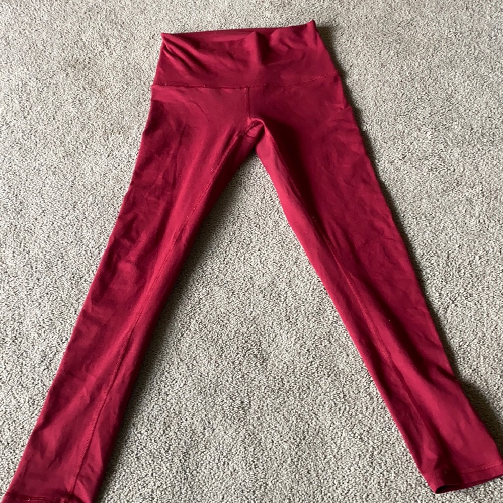 Fleo red leggings in bounce material size small